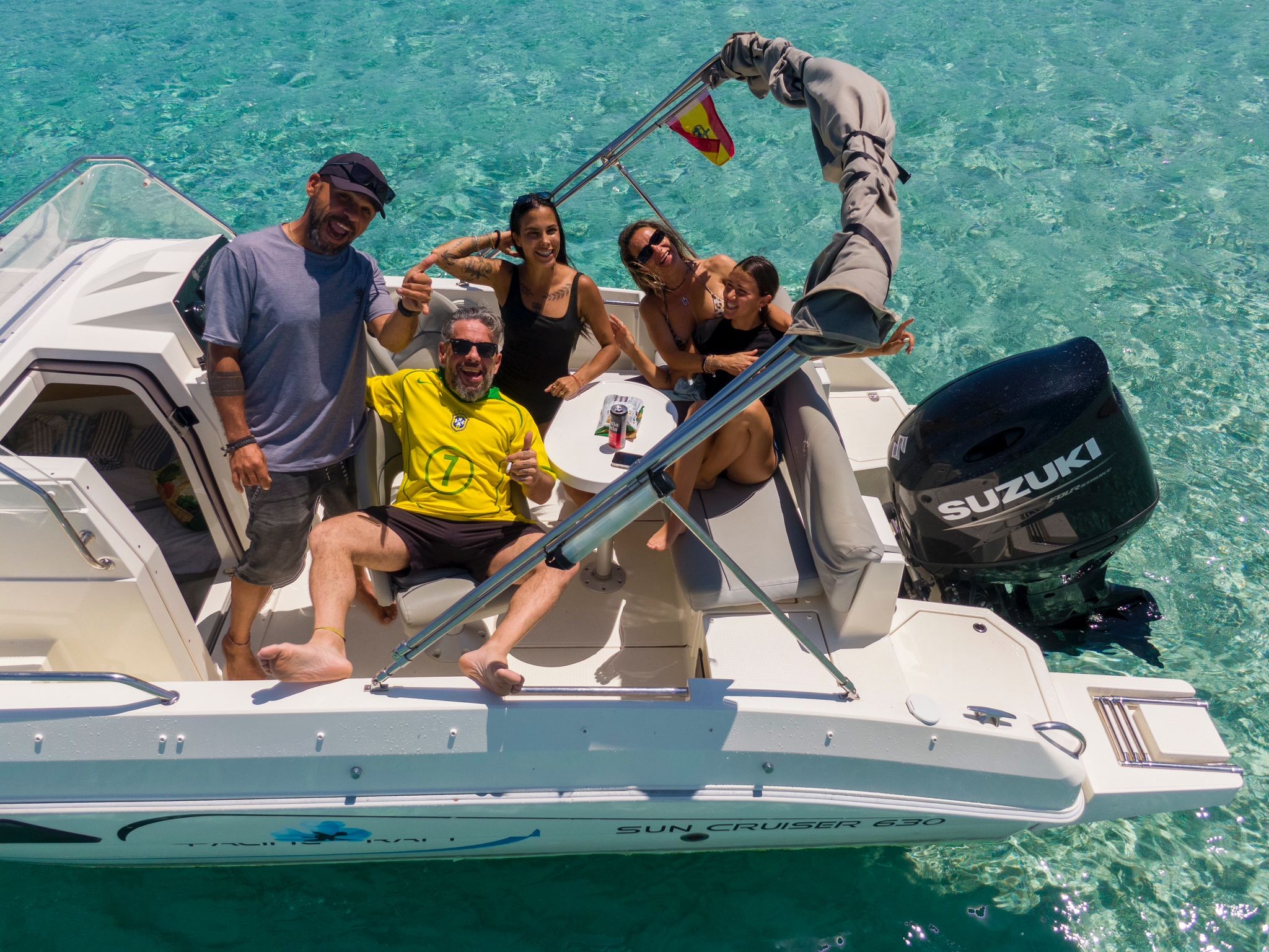 Group of friends enjoying the boat from above