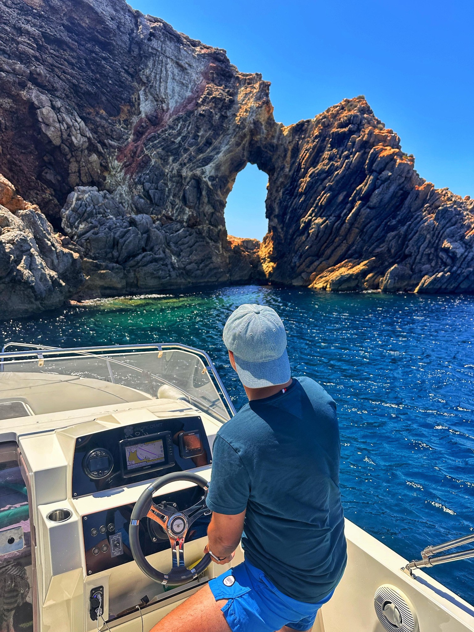 Natural rock arch seen from the boat