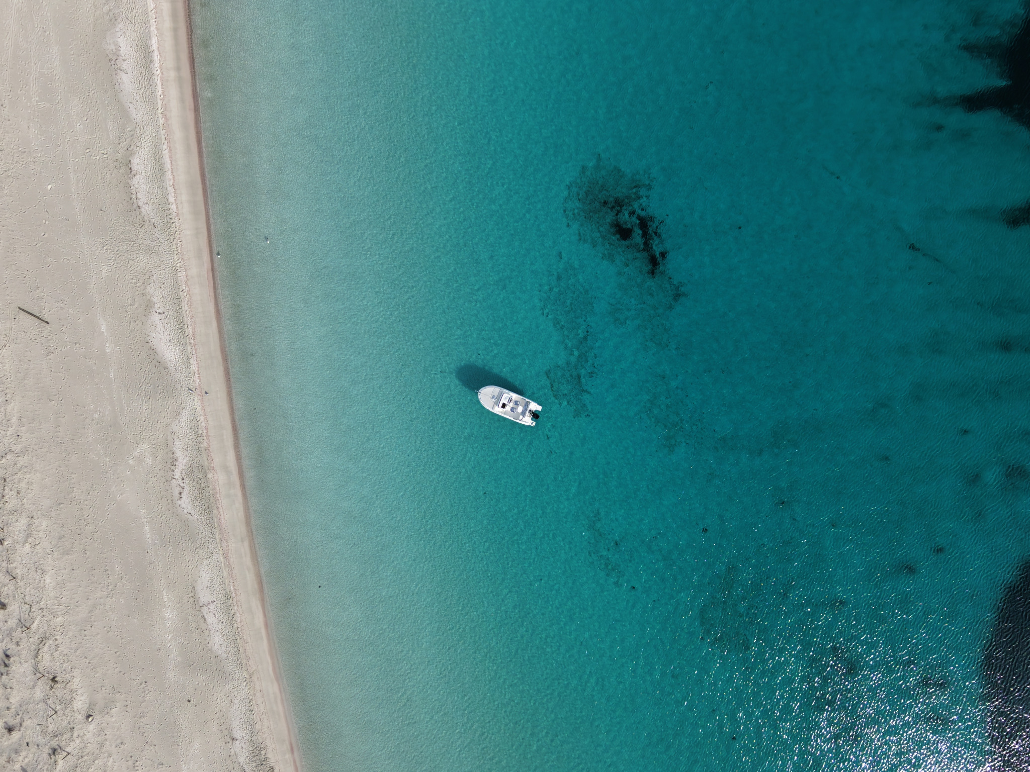 Buena Proa seen from drone over crystal-clear waters